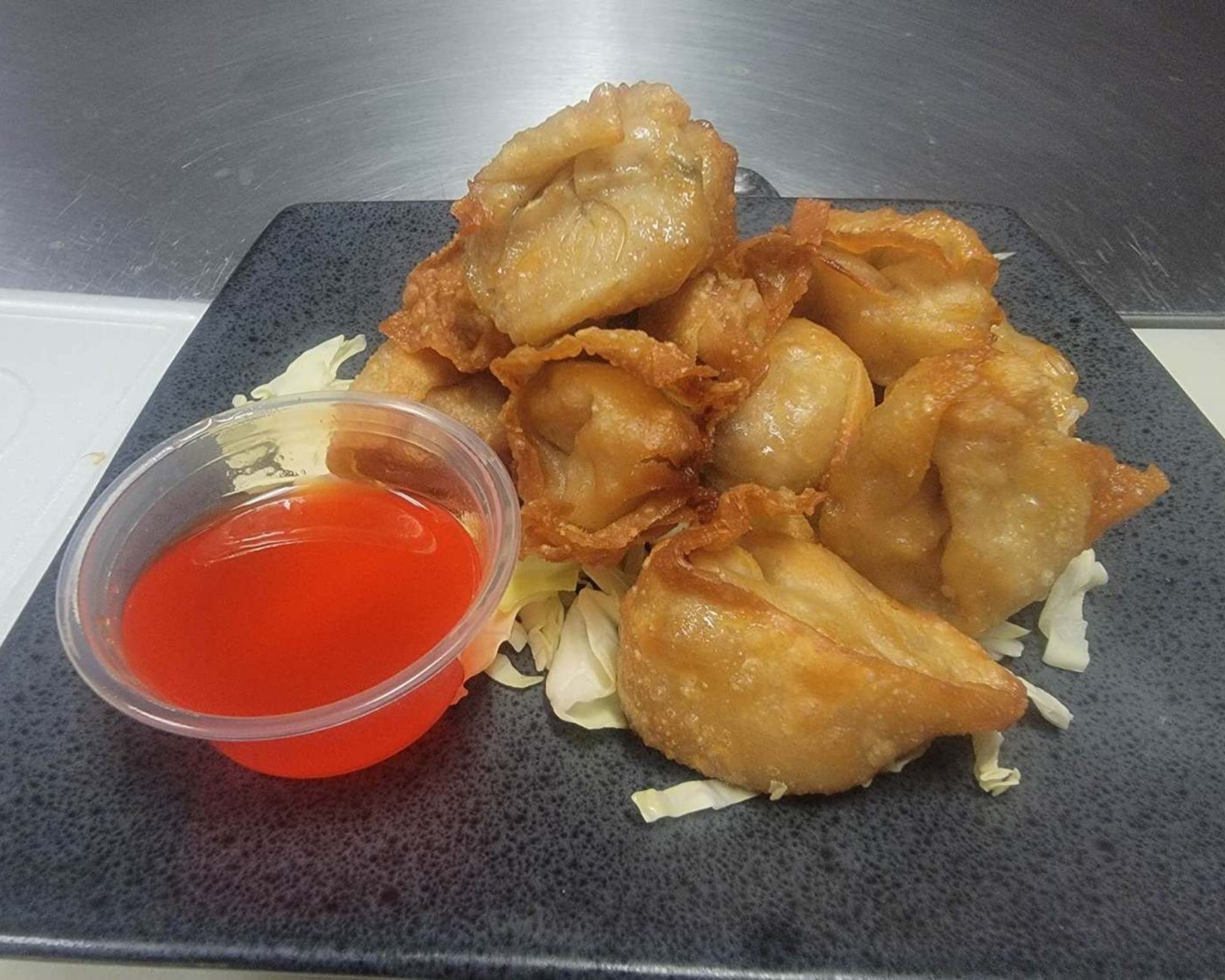 Crab Rangoon with sweet sauce at Gourmet Wok Chinese Food, a Chinese restaurant in Las Vegas.