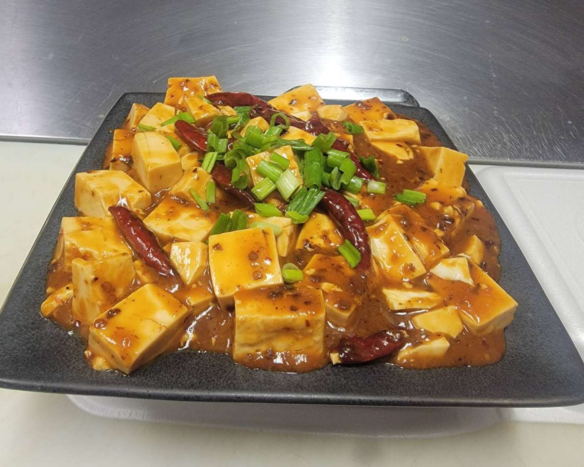 Spicy Ma Po tofu with scallions at Gourmet Wok Chinese Food, a Chinese restaurant in Las Vegas.