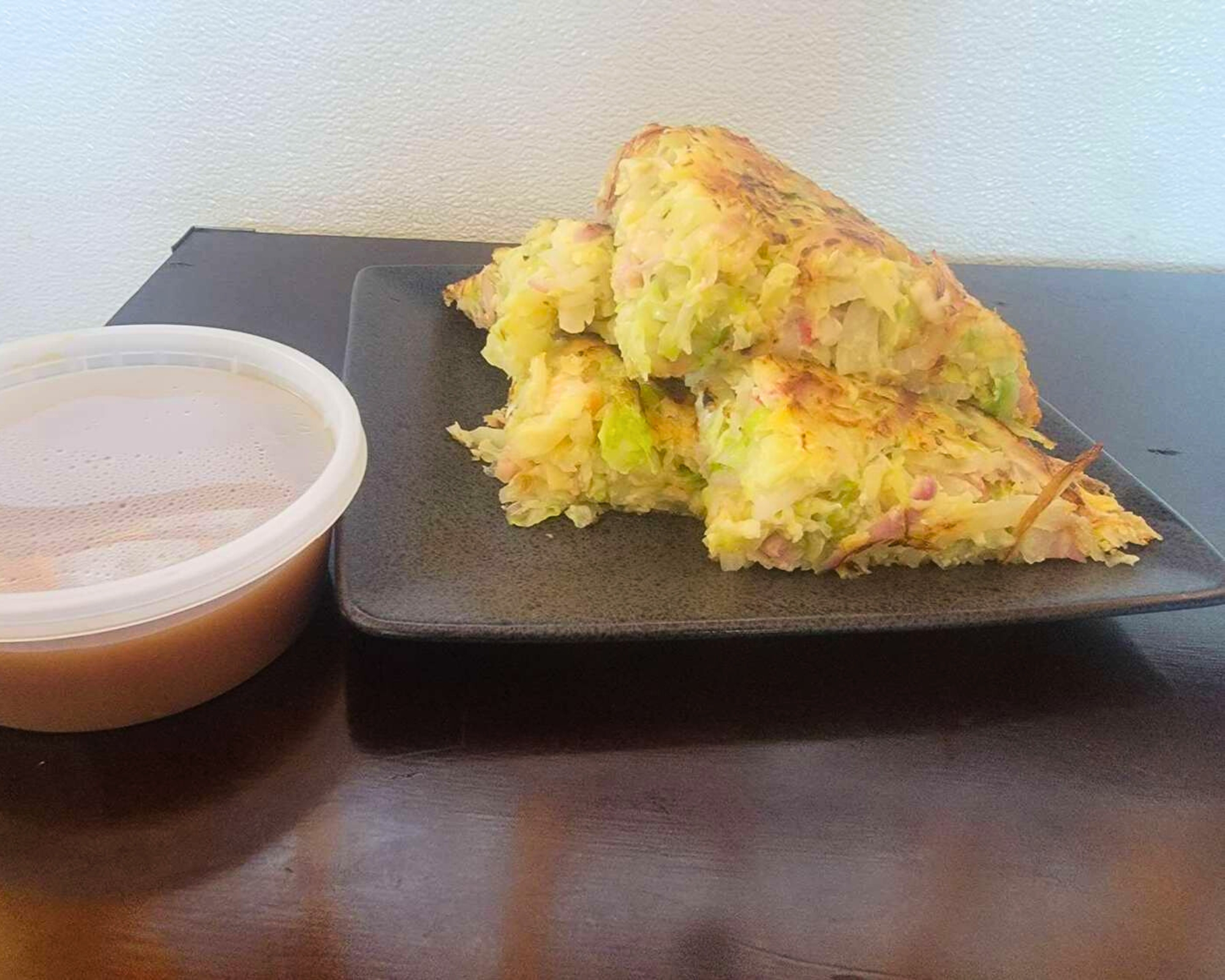 Okonomiyaki with sauce at Gourmet Wok Chinese Food, a Chinese restaurant in Las Vegas.