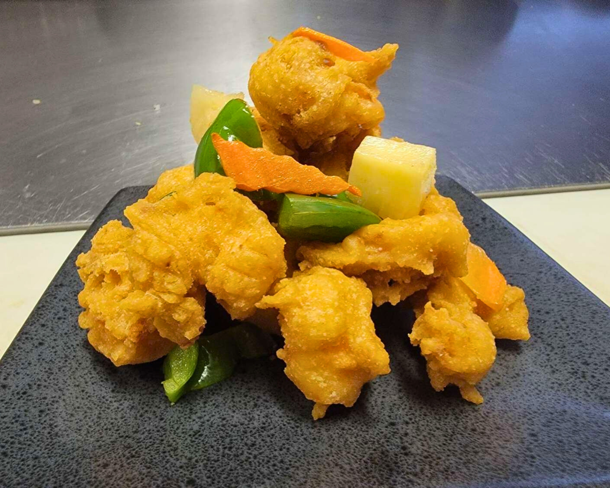 Crispy sweet and sour pork with veggies at Gourmet Wok Chinese Food, a Chinese restaurant in Las Vegas.